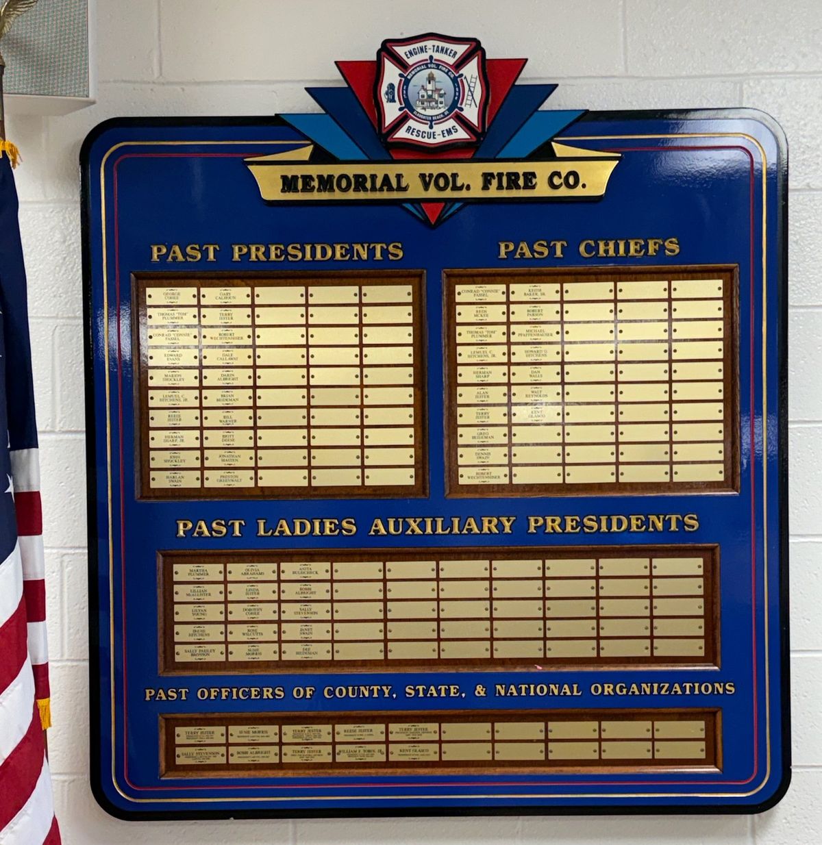 Plaque listing past presidents, past chiefs, and past Ladies Auxiliary presidents